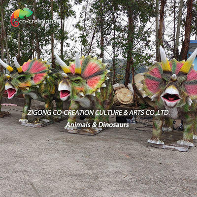 Realistic Animatronic Triceratops Trio: Vibrant Frills & Roaring Motion In Natural Setting